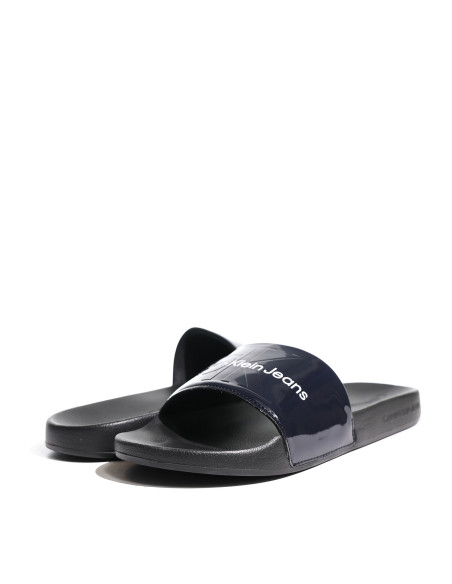 ქალის ჩუსტი CALVIN KLEIN - SLIDE METALLIC MONOLOGO