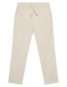 შარვალი GUESS - GMT DYE LYOCELL TWILL PANTS